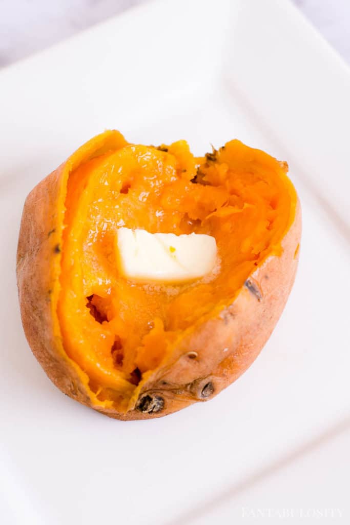 Sweet Potatoes with Butter on a white plate