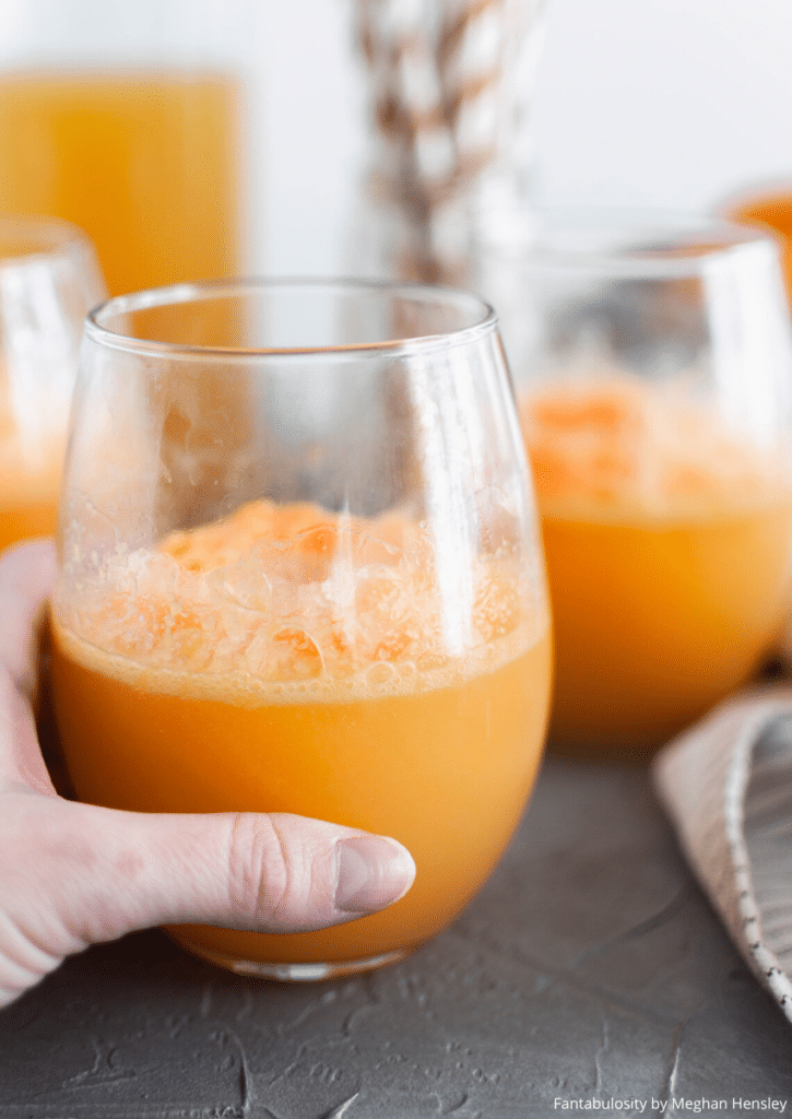 This 3 ingredient Orange Sherbet Punch is perfect for all your upcoming holiday parties. Whip up a batch and watch it disappear. All you need is orange sherbet, lemon lime soda and orange juice.