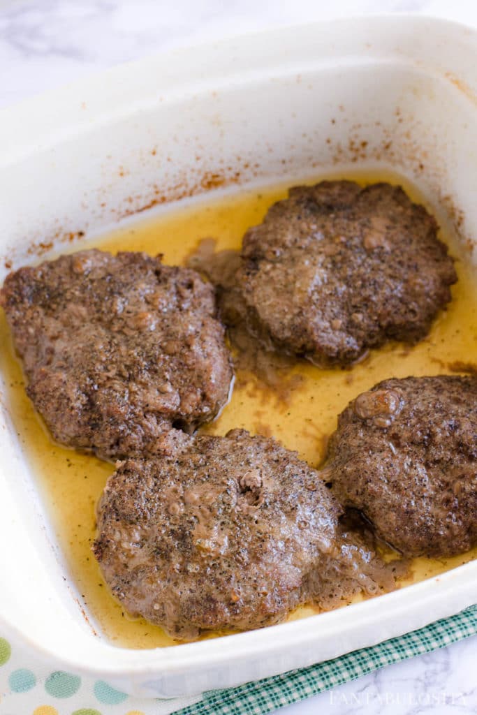 Baked hamburgers in baking dish