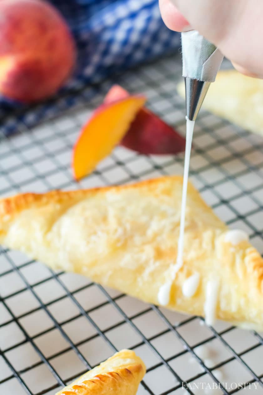 drizzle on peach turnovers