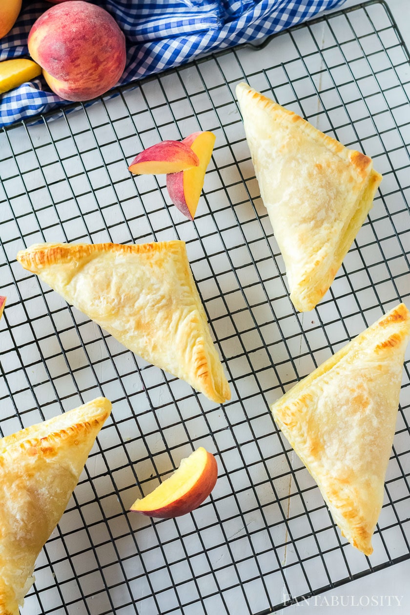 peach turnovers on cooling rack