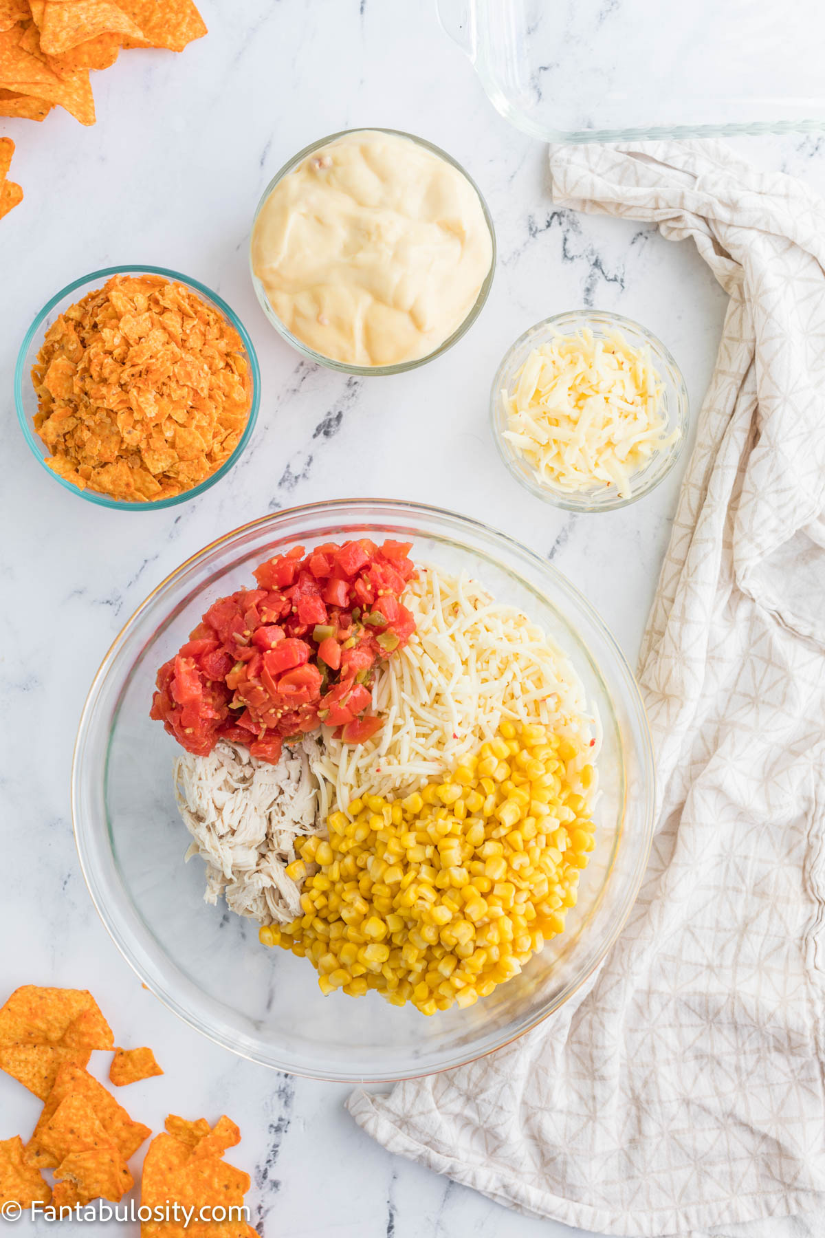 Doritos chicken casserole ingredients in a bowl