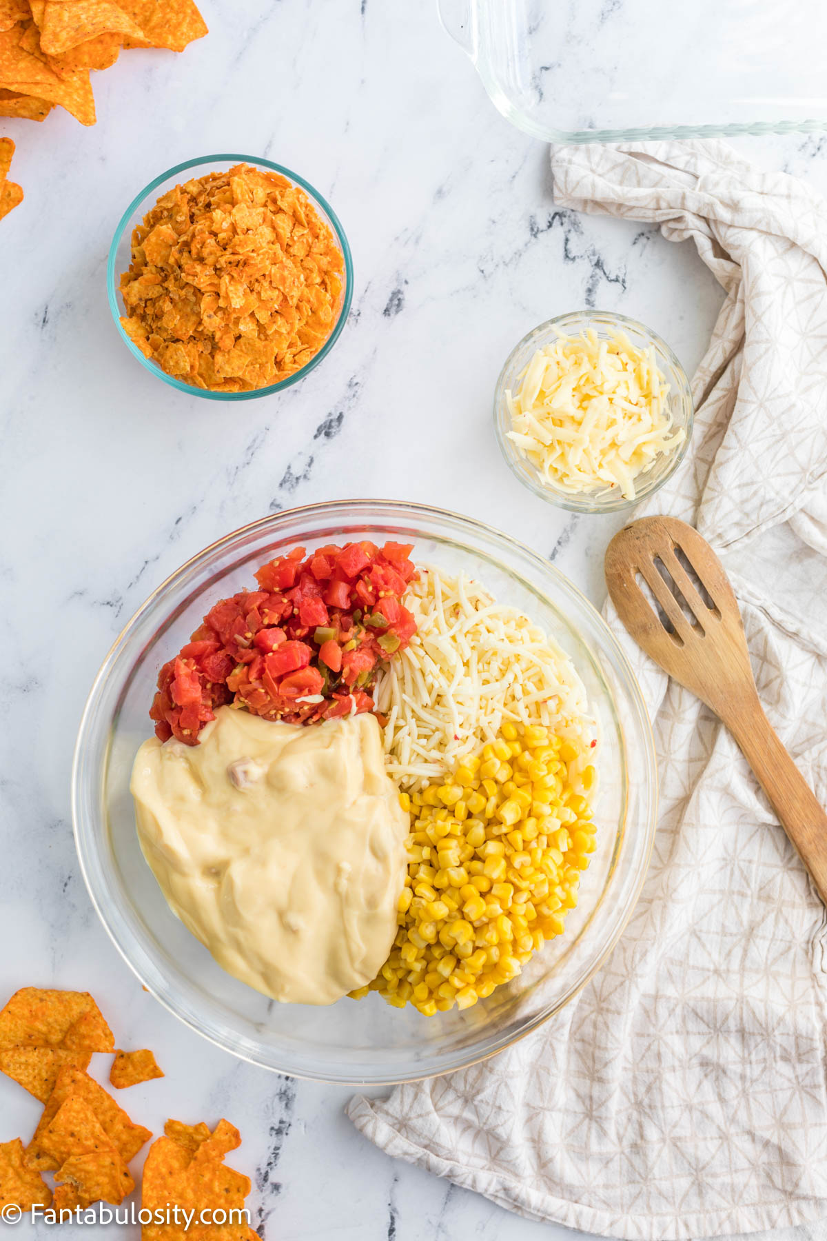 Pour ingredients in to a bowl for chicken dorito casserole