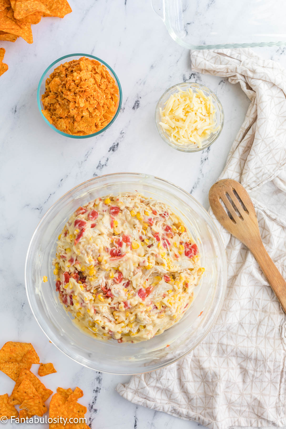 Ingredients mixed together for chicken doritos casserole