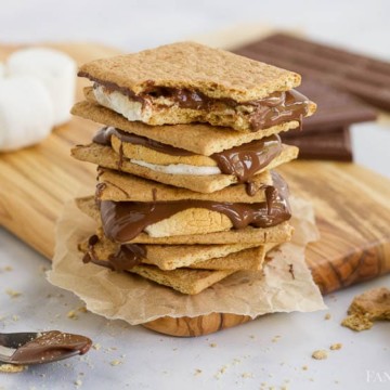 Airy Fryer Smores, stacked on a wooden cutting board
