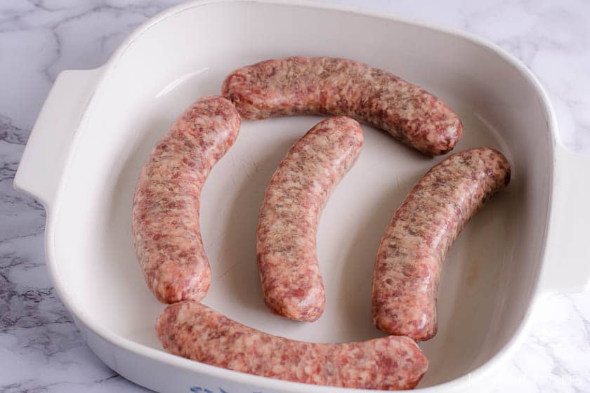 Raw Bratwursts in the baking pan