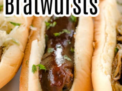 brats cooked in the oven with toppings, and text on image