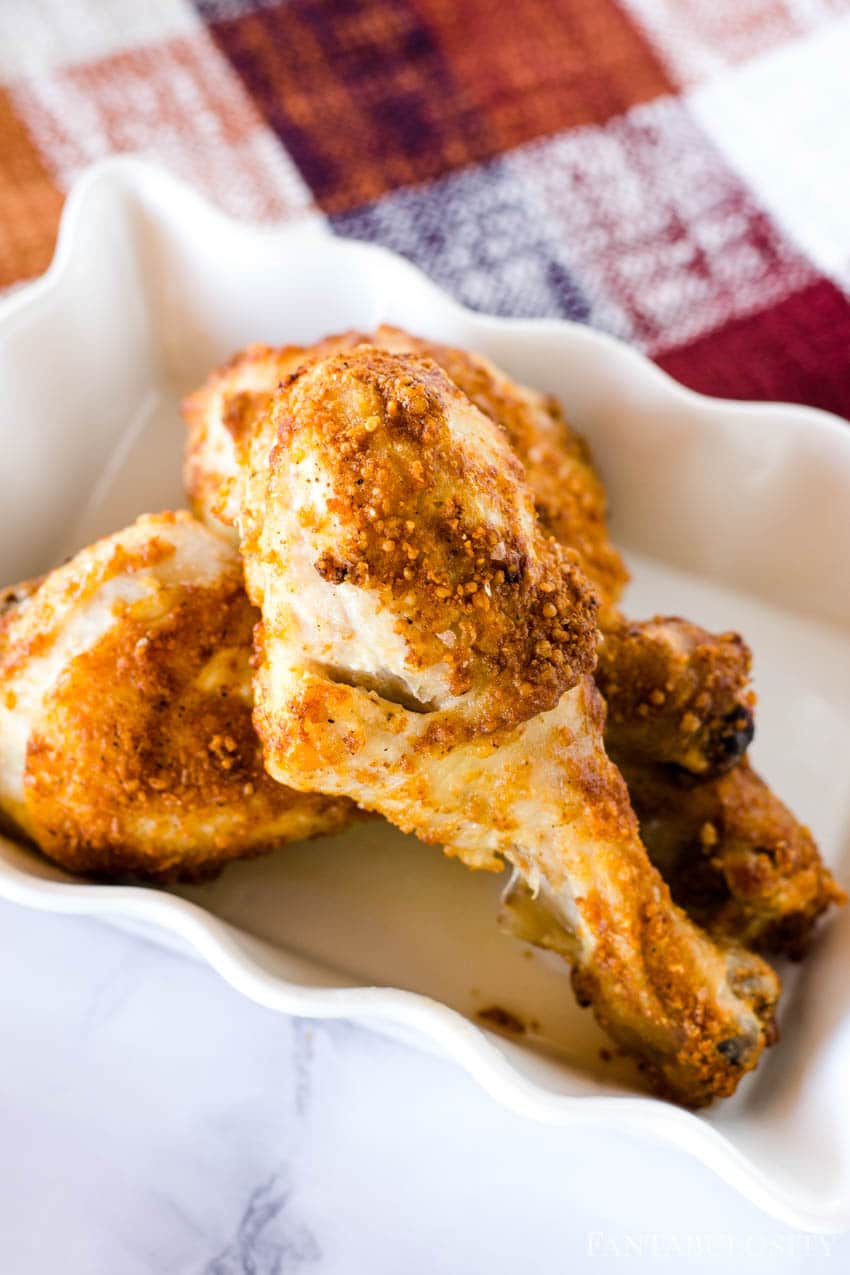 air fryer chicken legs in white dish