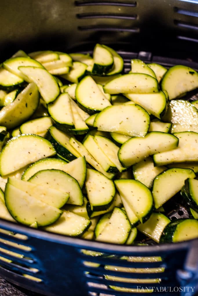 Pour zucchini in to air fryer