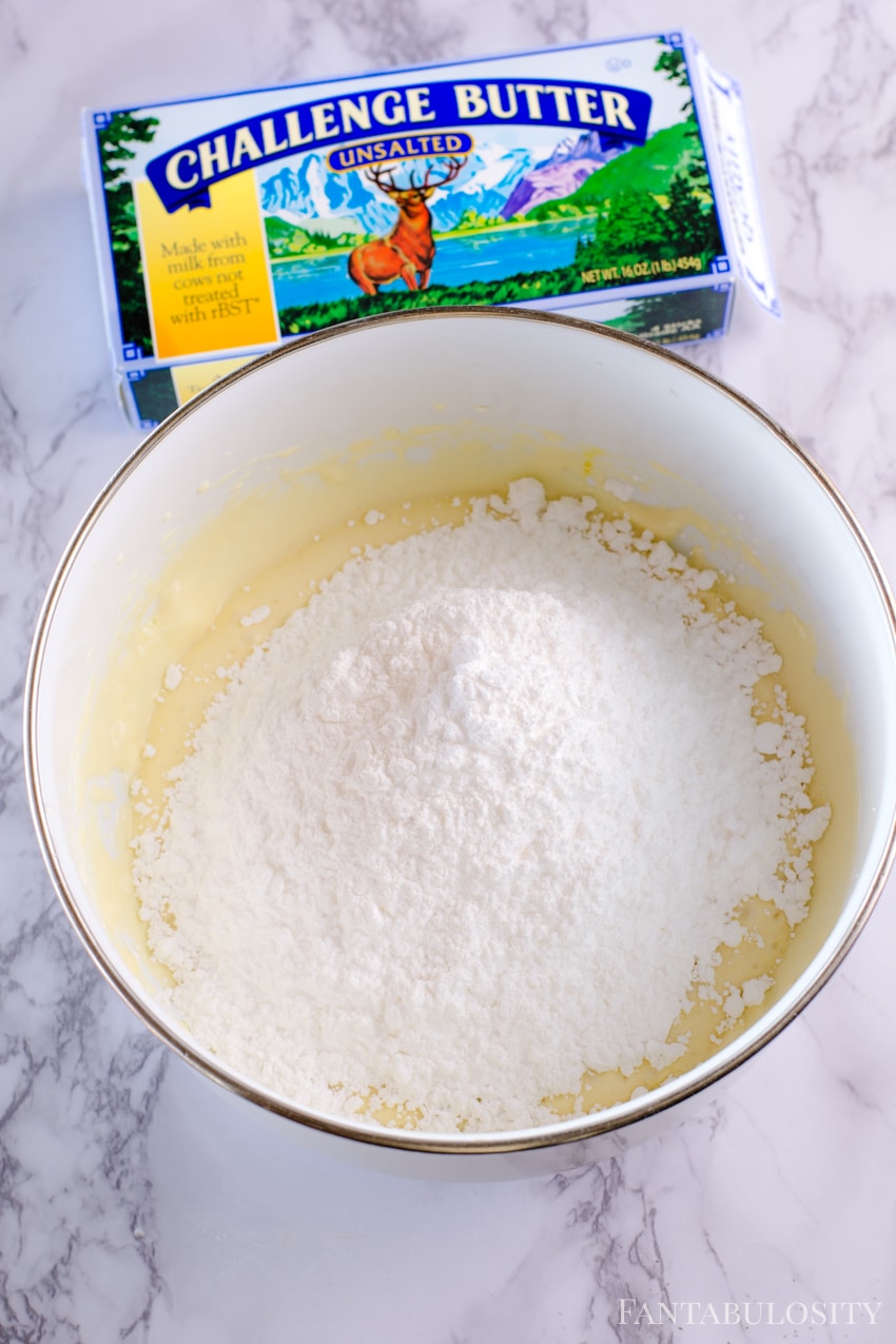 Add powdered sugar to gooey butter cake mix