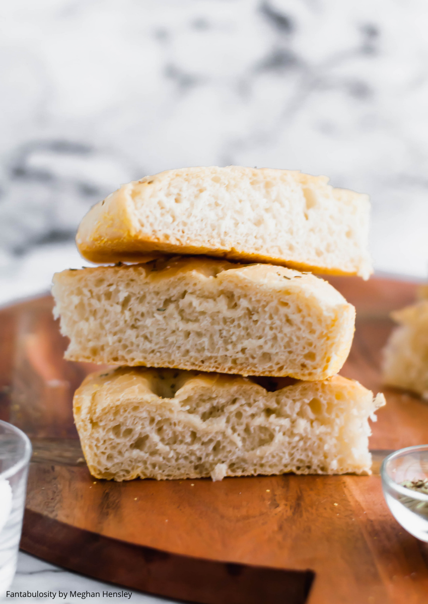 Homemade bread is easier than you think. This focaccia bread uses simple, pantry staples and transforms them into a bread with a soft, fluffy interior and perfectly chewy exterior. A definite crowd pleaser.