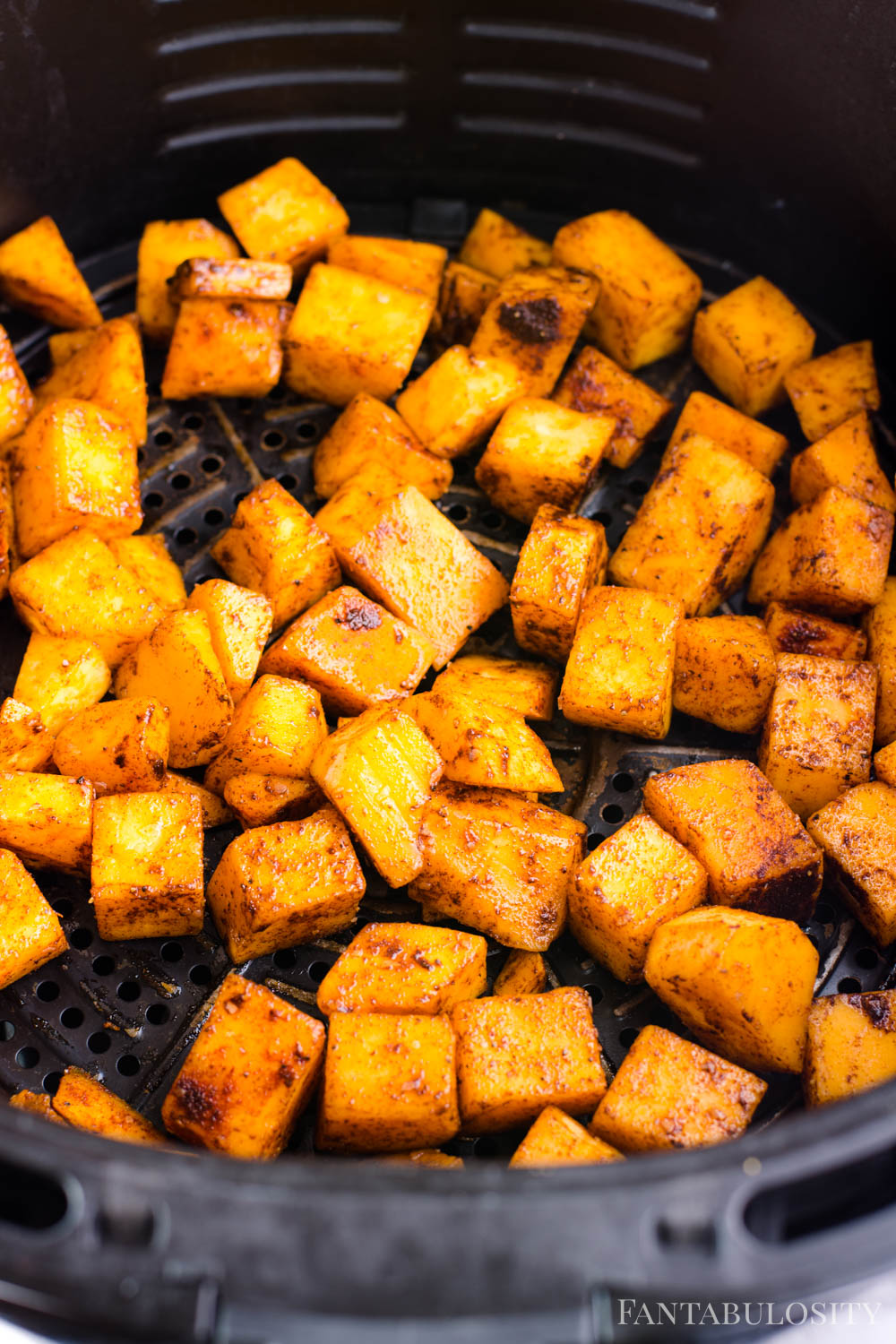 Cook butternut squash cubes in air fryer