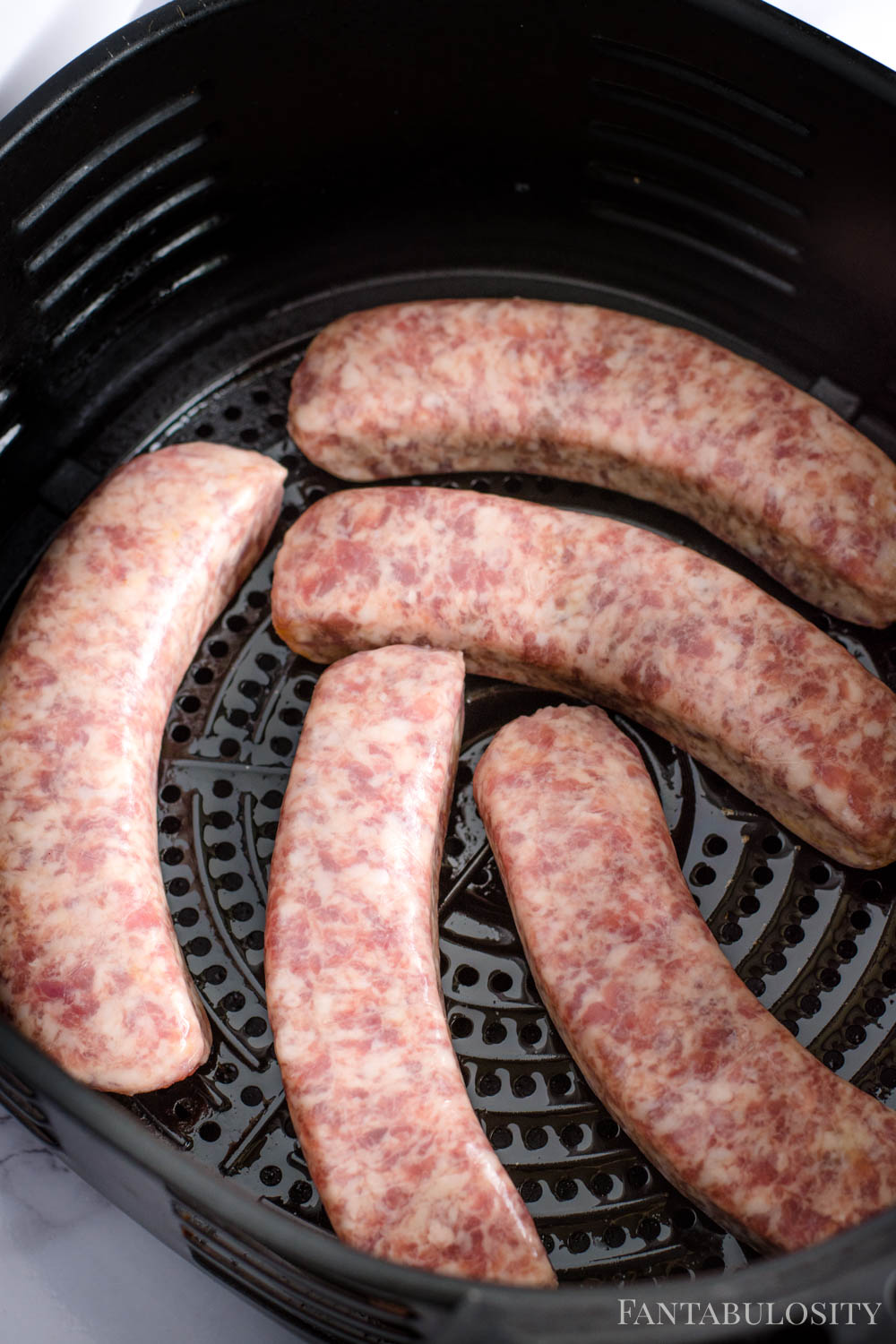 Place brats in air fryer basket