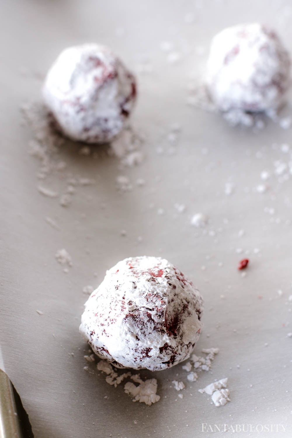 Coat cookies in powdered sugar