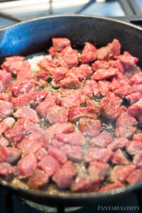 Add steak bites to cast iron
