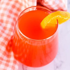 fruit punch in glass with orange slice