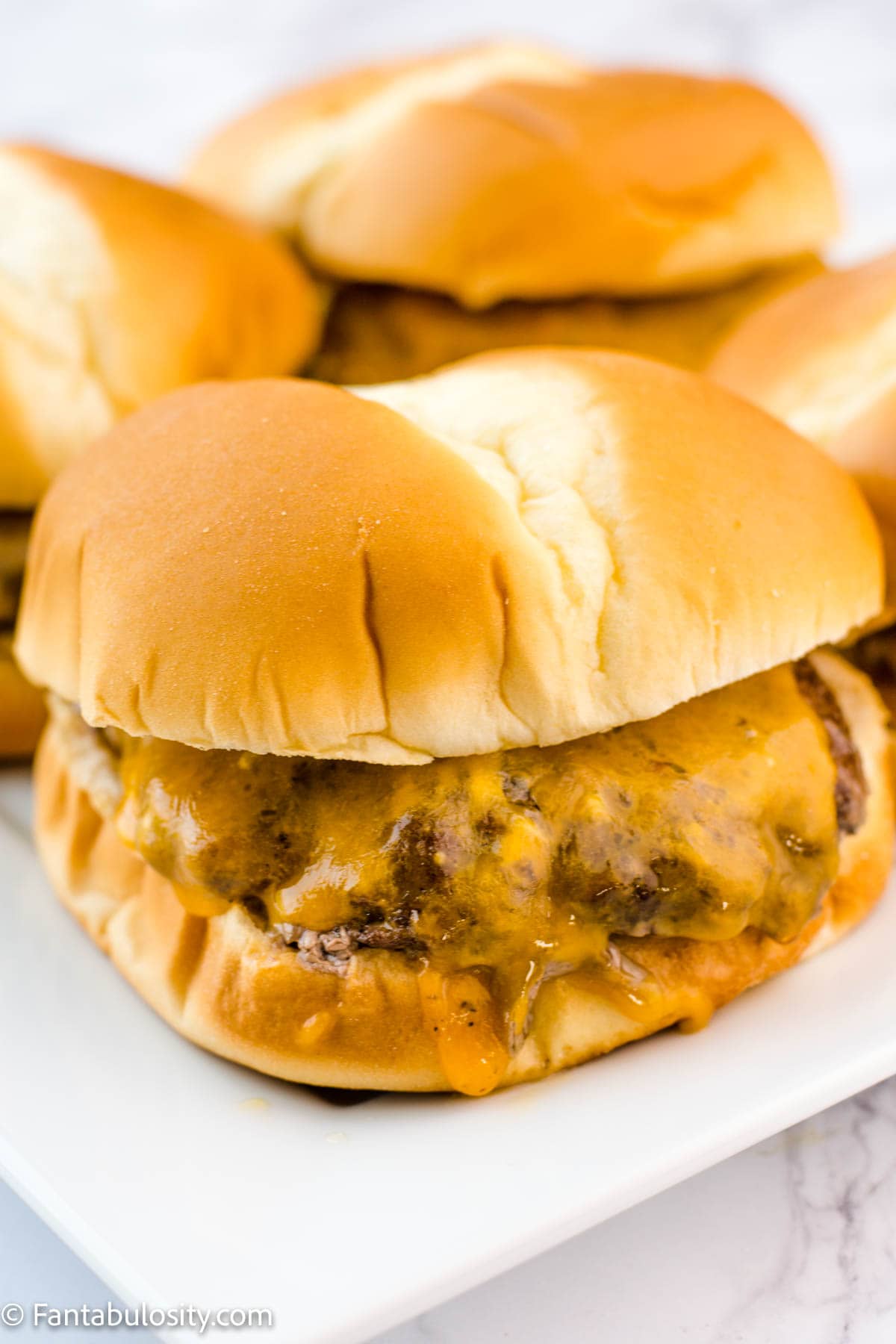 Frozen burger patty baked in the oven and on buns.