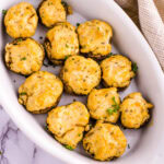 Smoked stuffed mushrooms in a platter.