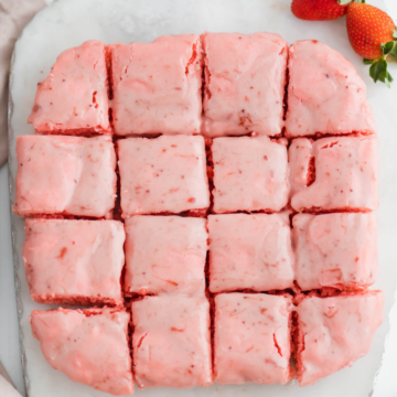 Strawberry Brownies using a store-bought strawberry cake mix are the easiest dessert. Just minutes to make and packed with strawberry flavor, they'll quickly become your new go to dessert.