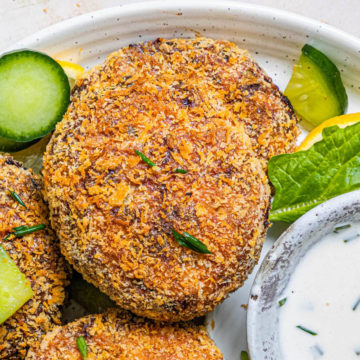 air fryer salmon cakes on a plate with dip