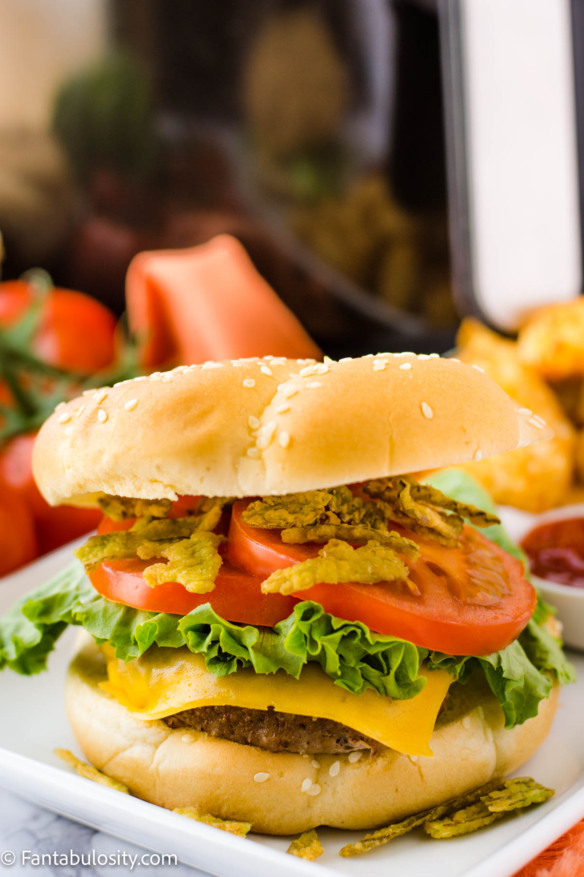 Loaded turkey burgers on a white plate.