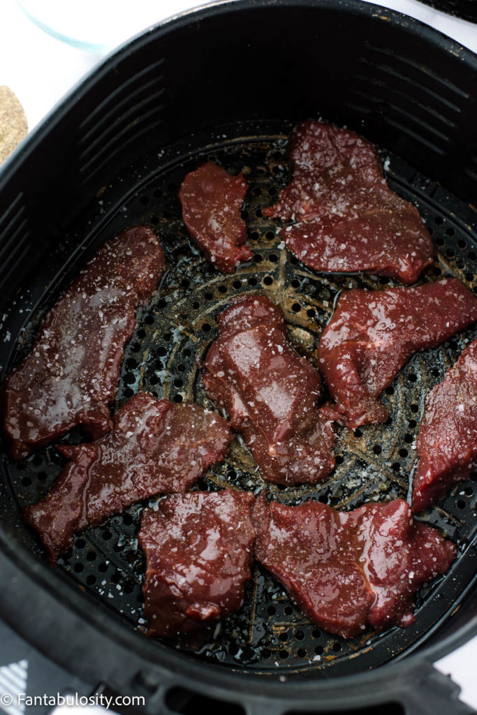 Place venison steaks in to air fryer basket