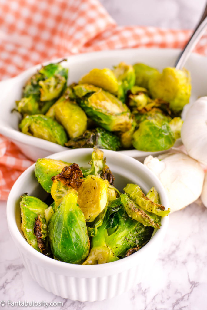 Roasted Brussels Sprouts in white bowls