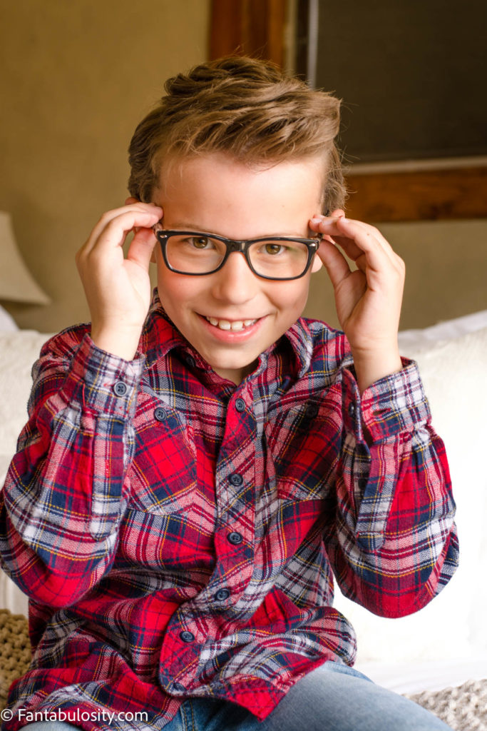 Little boy wearing RayBan prescription eyeglasses