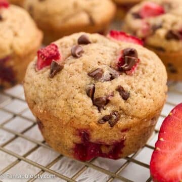 Strawberry chocolate muffins on cooling rack.