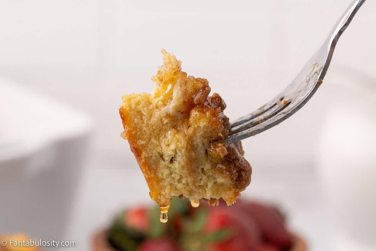 Piece of French toast casserole on fork.