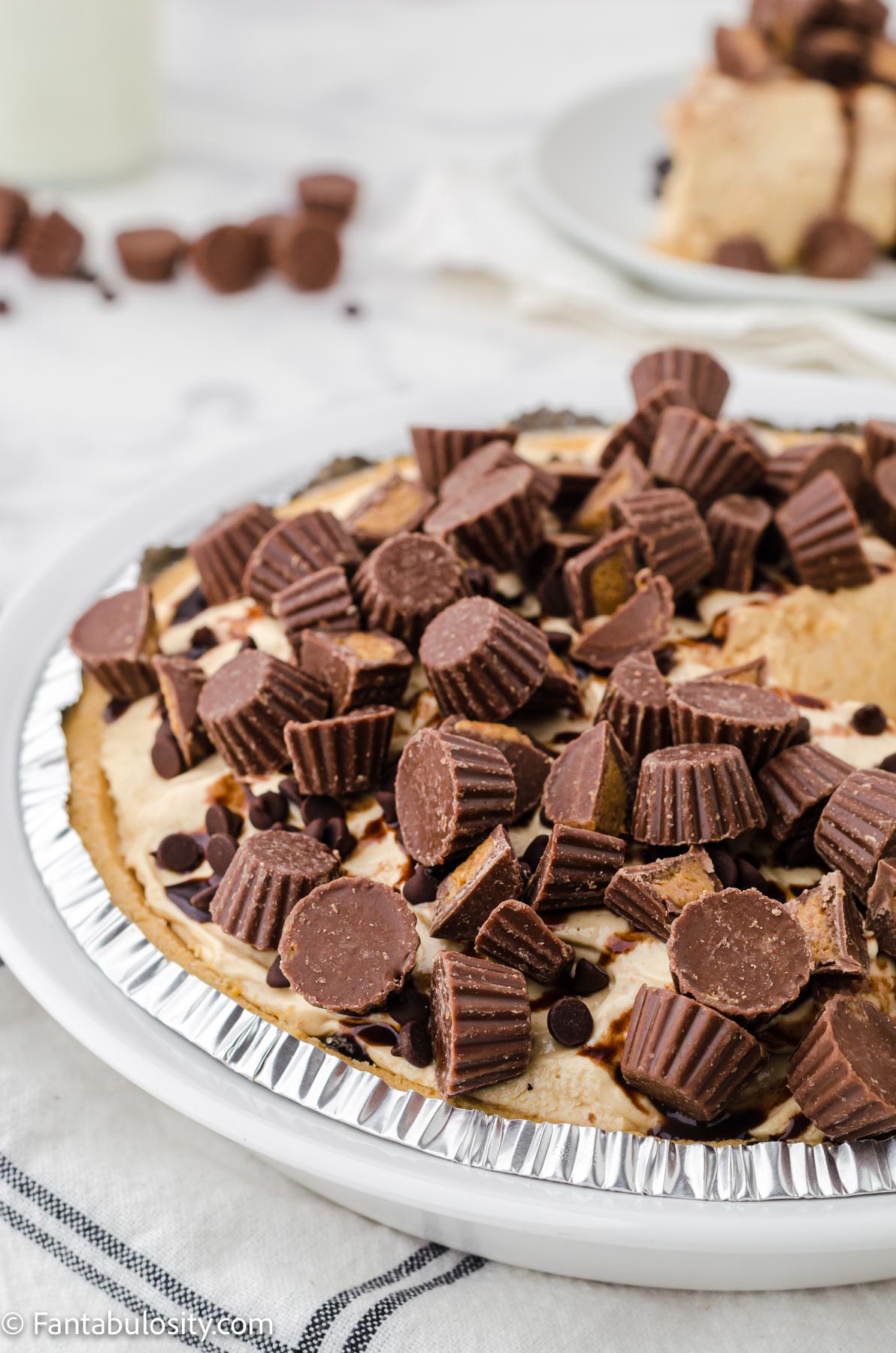 Reeses cups on top of no bake peanut butter pie