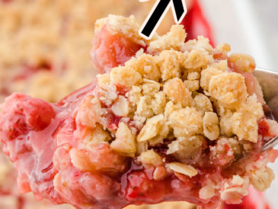 strawberry crumble scooped out of baking dish