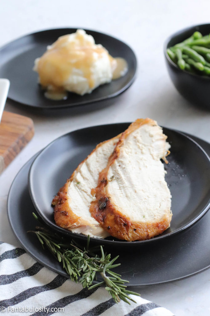 Slices of air fried turkey breast on a plate.