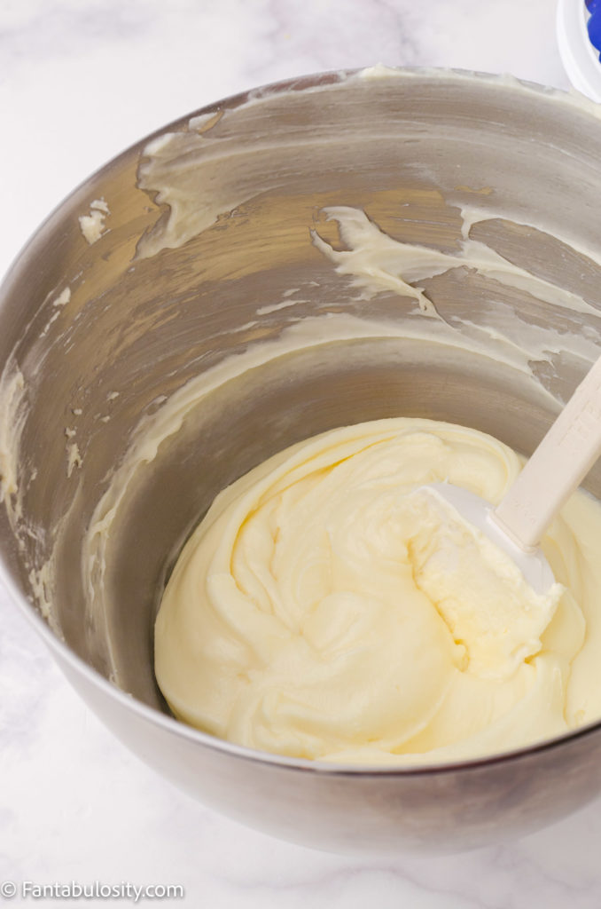 cream cheese and butter in mixing bowl for ding dong cake