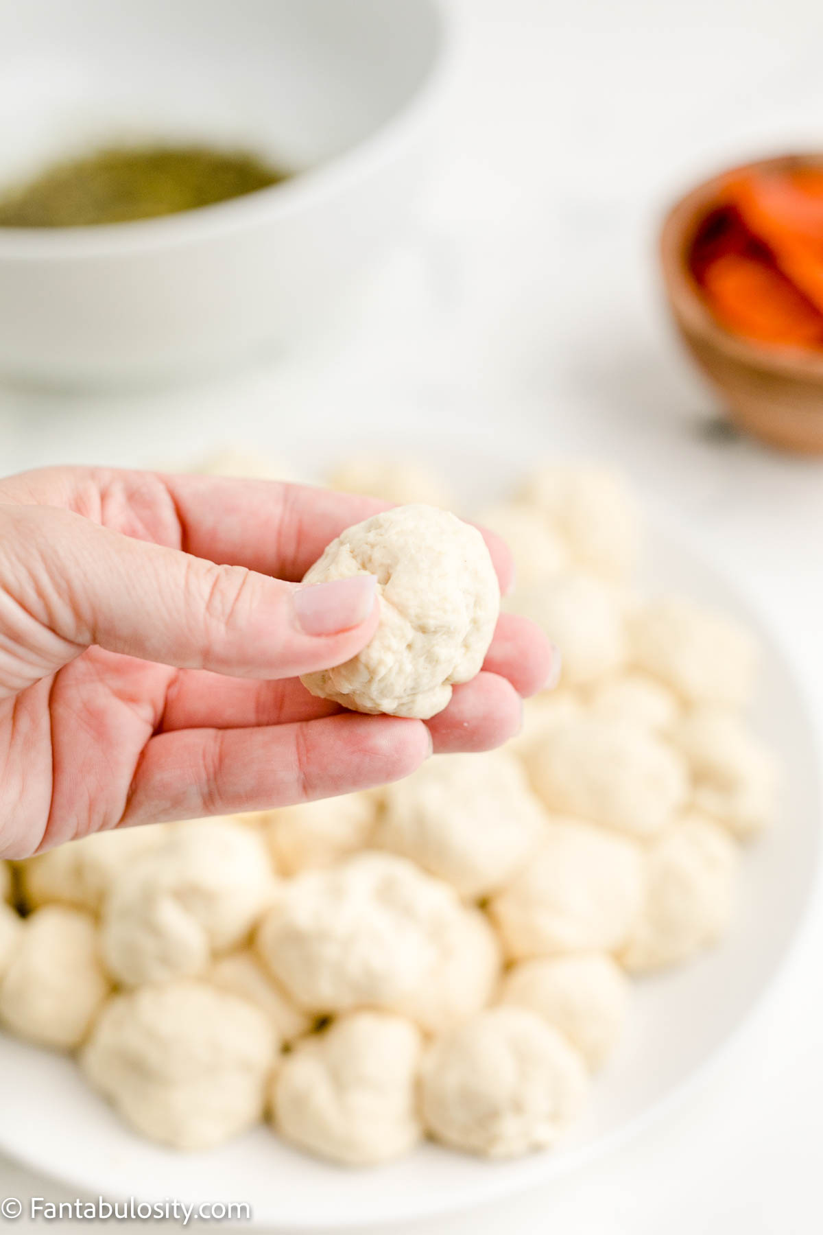 Rolled balls of dough for pizza monkey bread