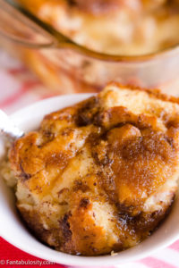 Bread pudding serving in small white bowl