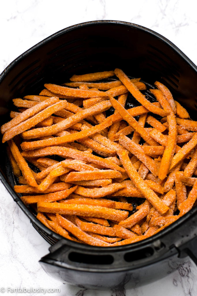 Frozen sweet potato fries in air fryer basket
