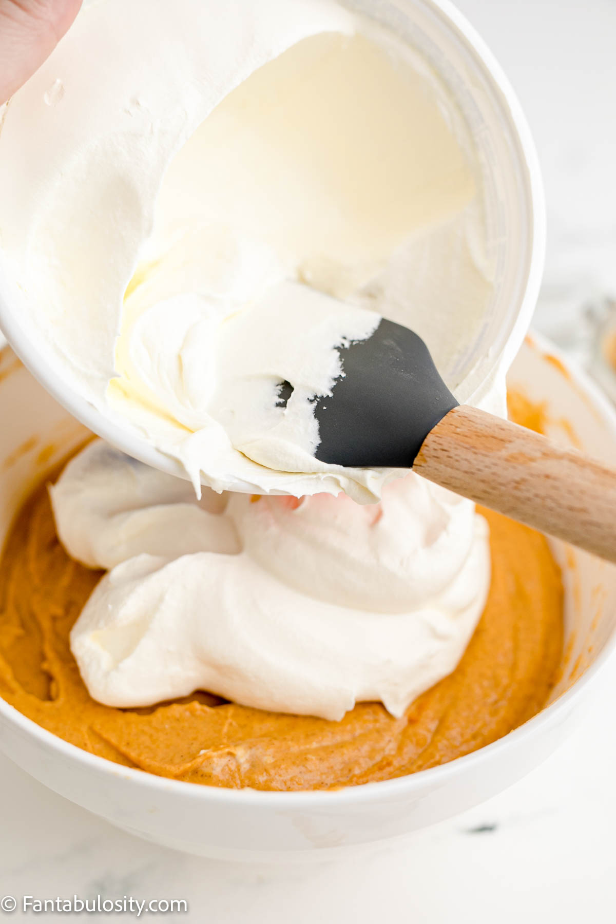 Fold in cool whip to pumpkin