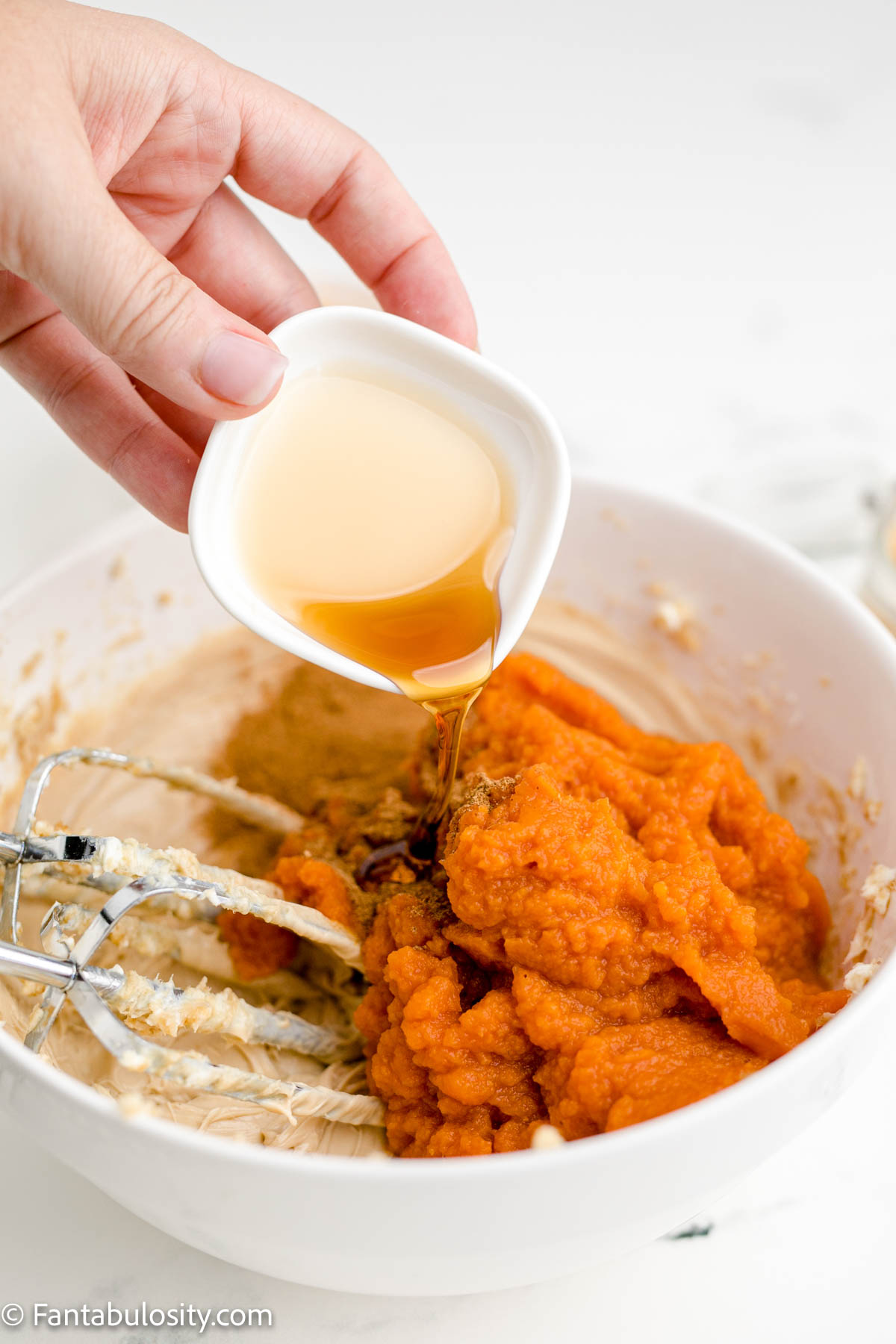 Adding maple syrup to pumpkin fluff