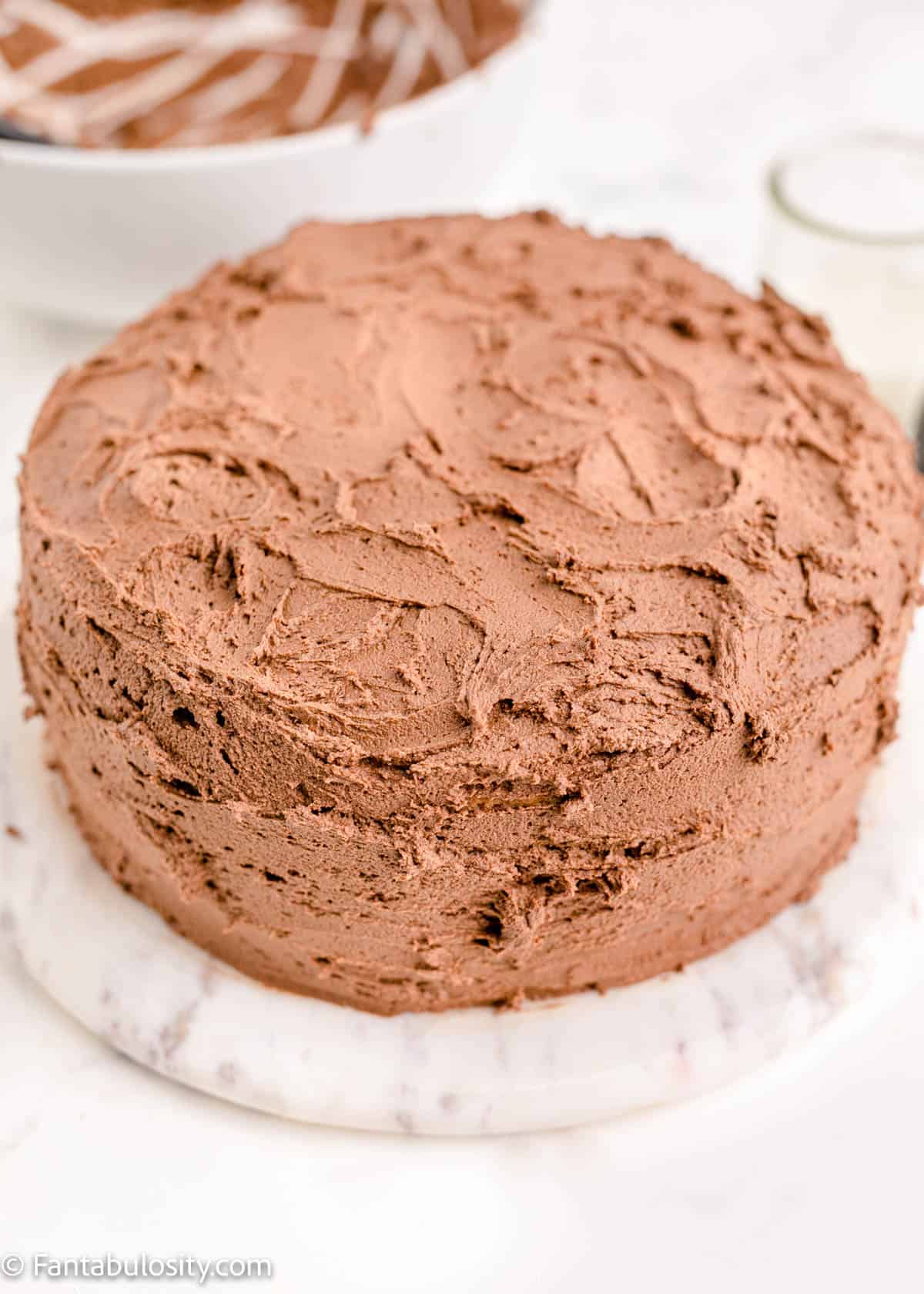 Cake covered with chocolate buttercream frosting