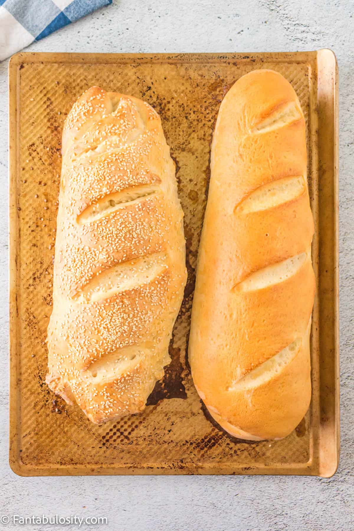 baked white Italian bread on baking sheet