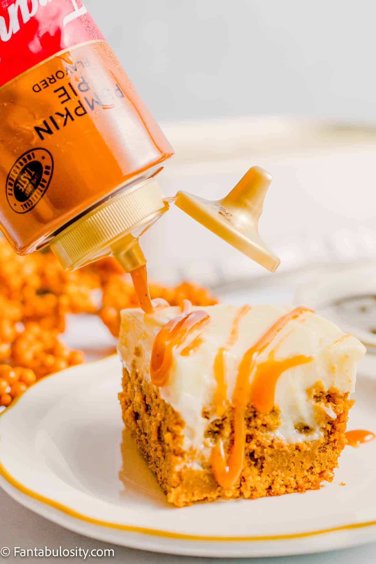 Drizzle caramel sauce on cake