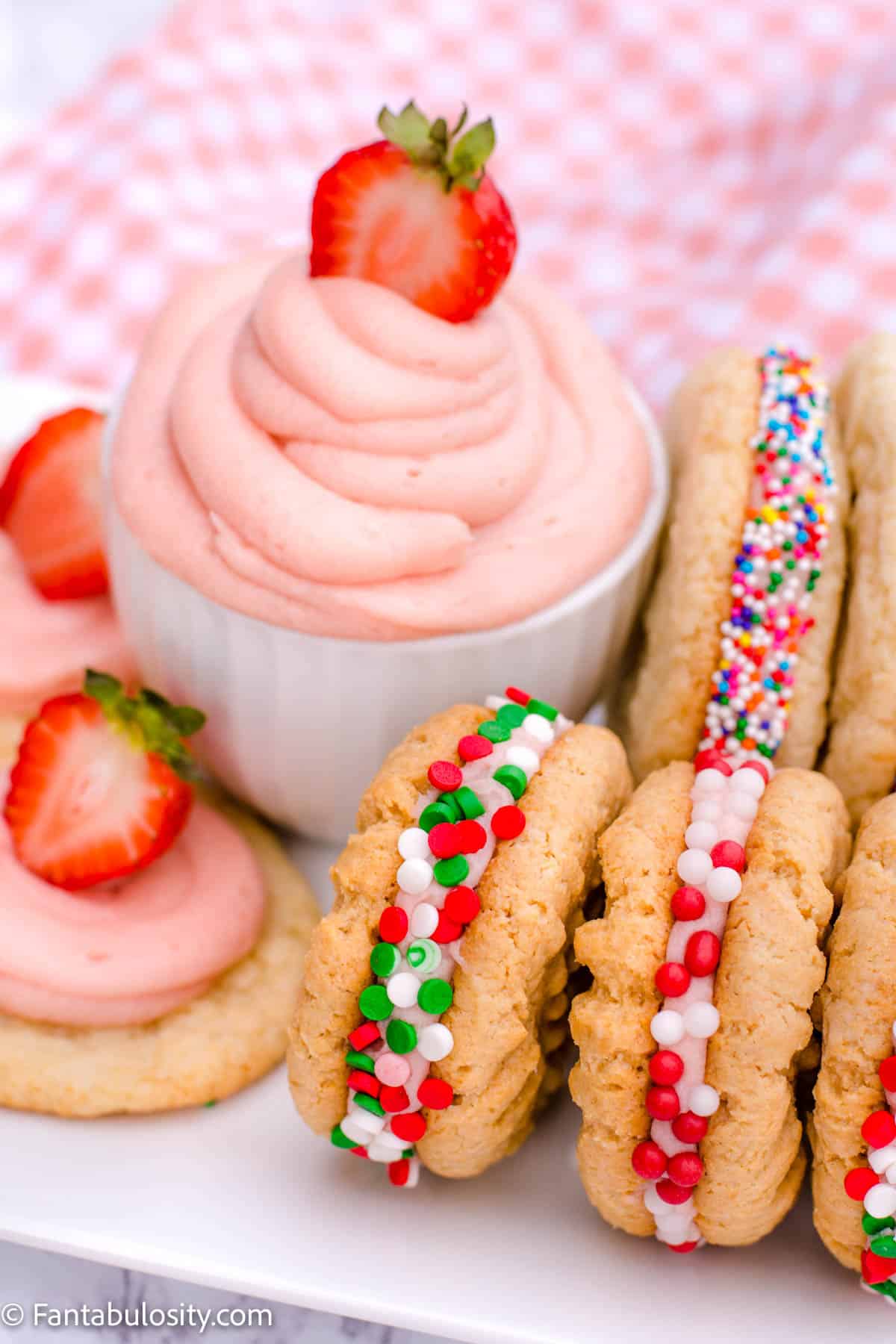 Strawberry frosting filled cookies