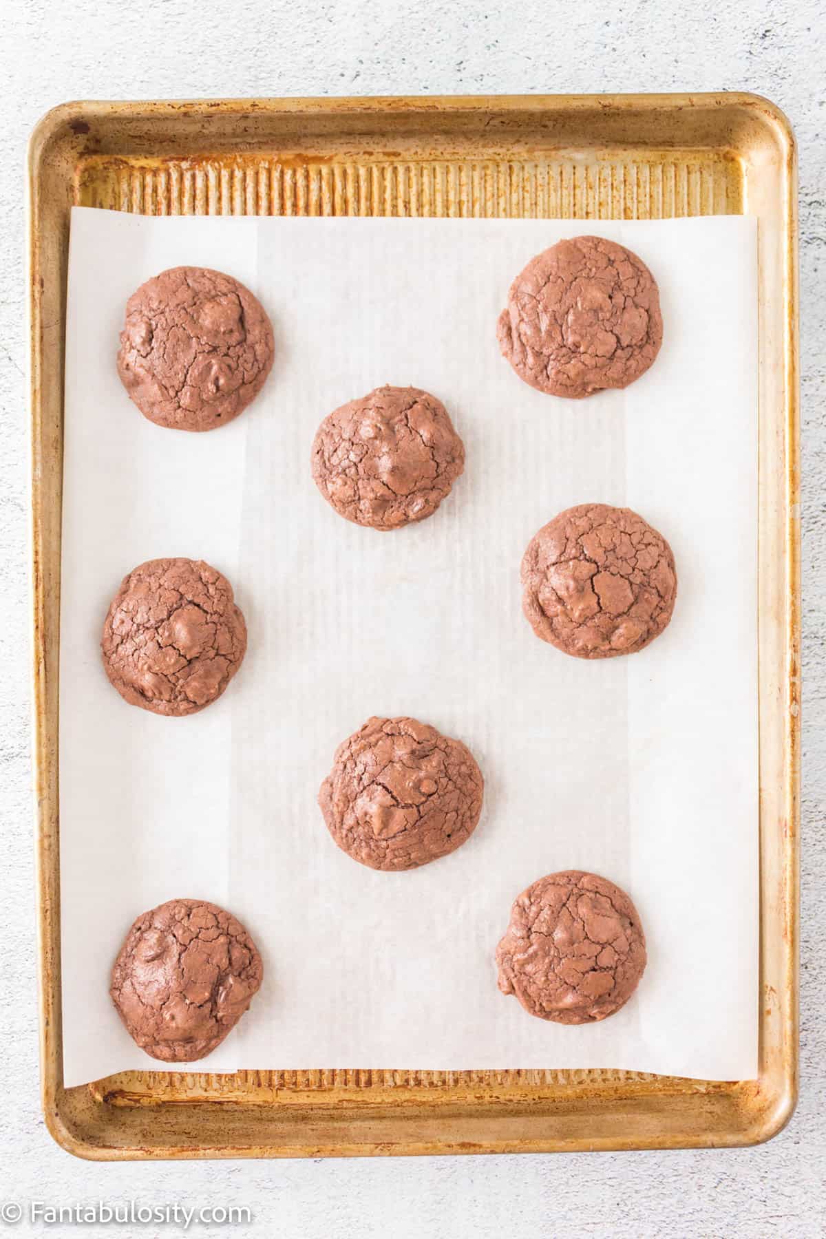 Baked brownie mix cookies on cookie sheet.