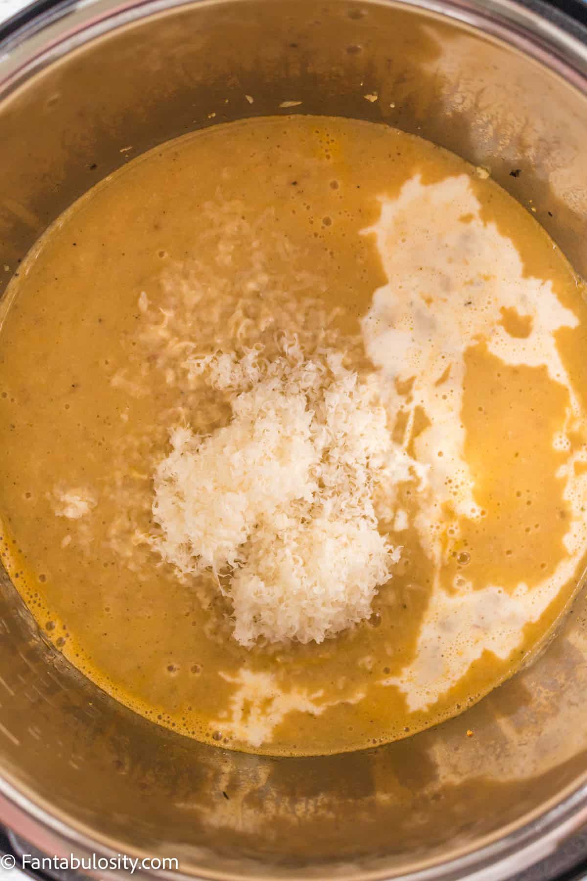 Add cream and parmesan cheese to instant pot.