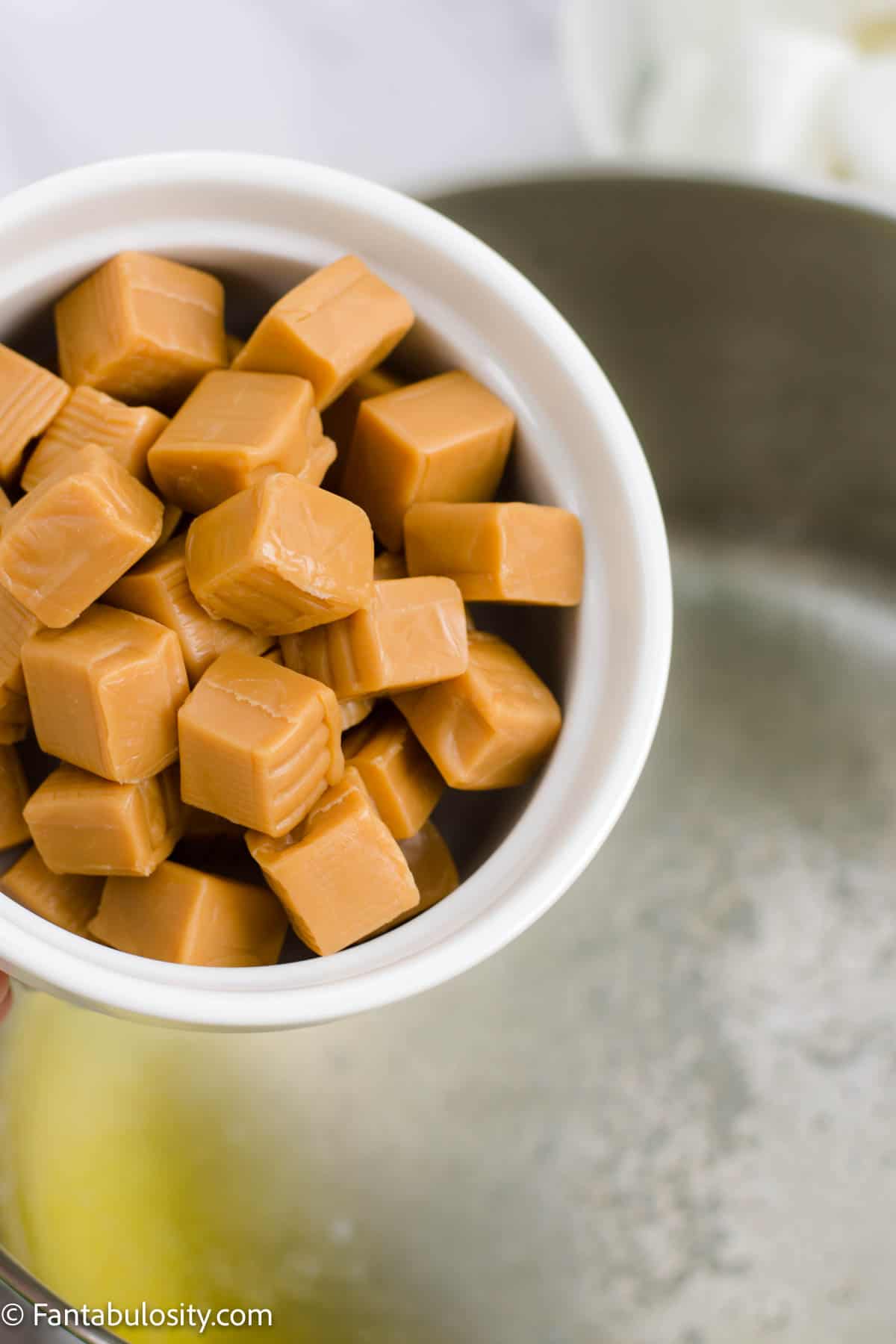 Add caramels to butter.