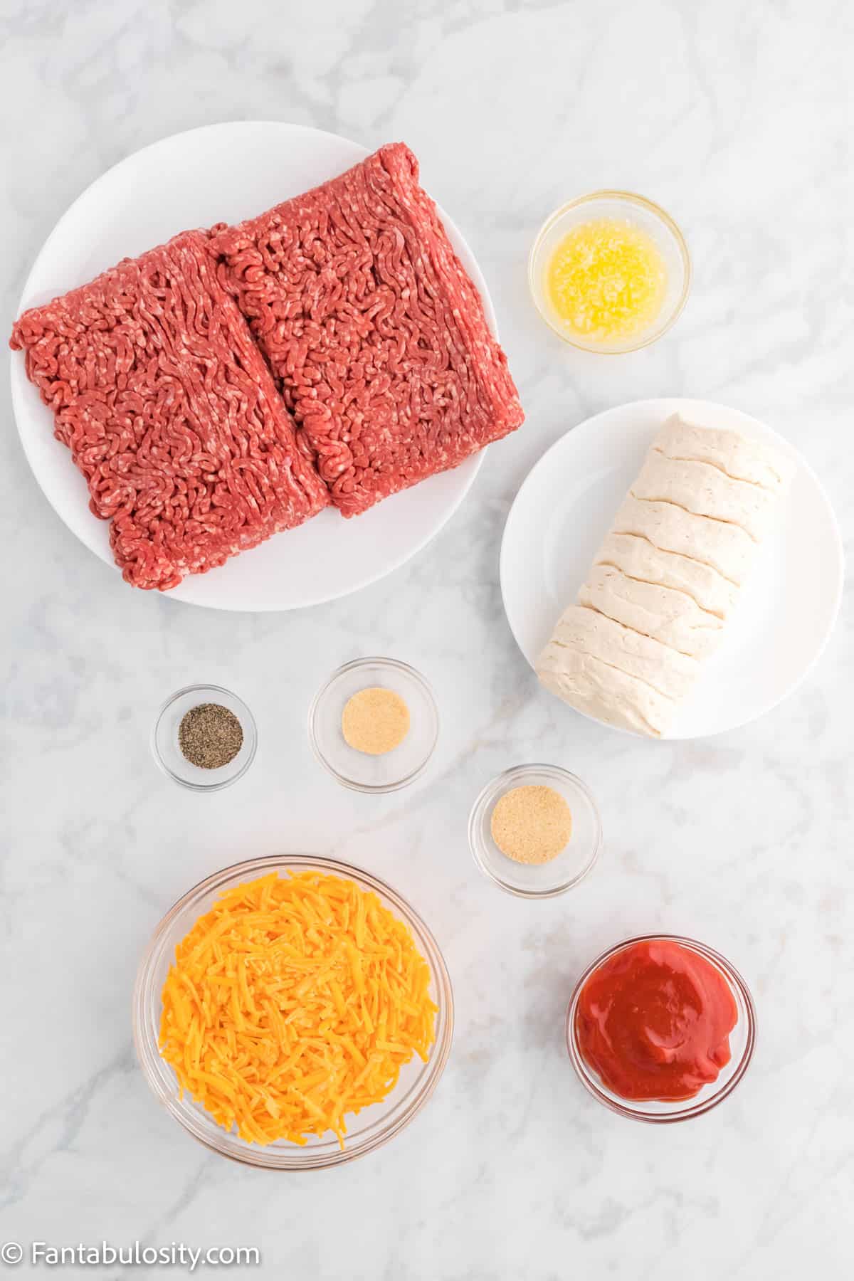 A picture of the ingredients you need to make a cheeseburger casserole.
