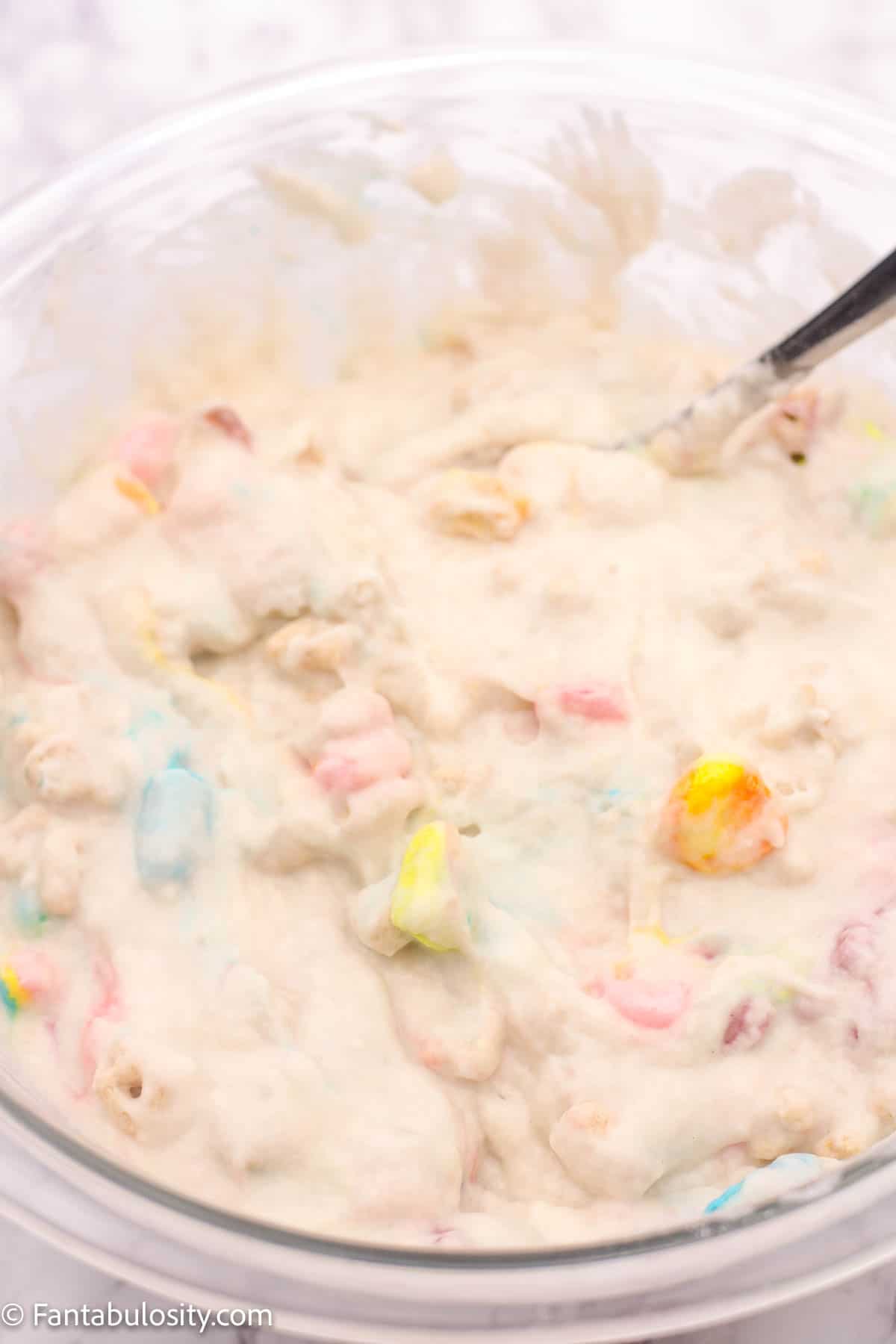 Pancake batter in bowl with Lucky Charms cereal