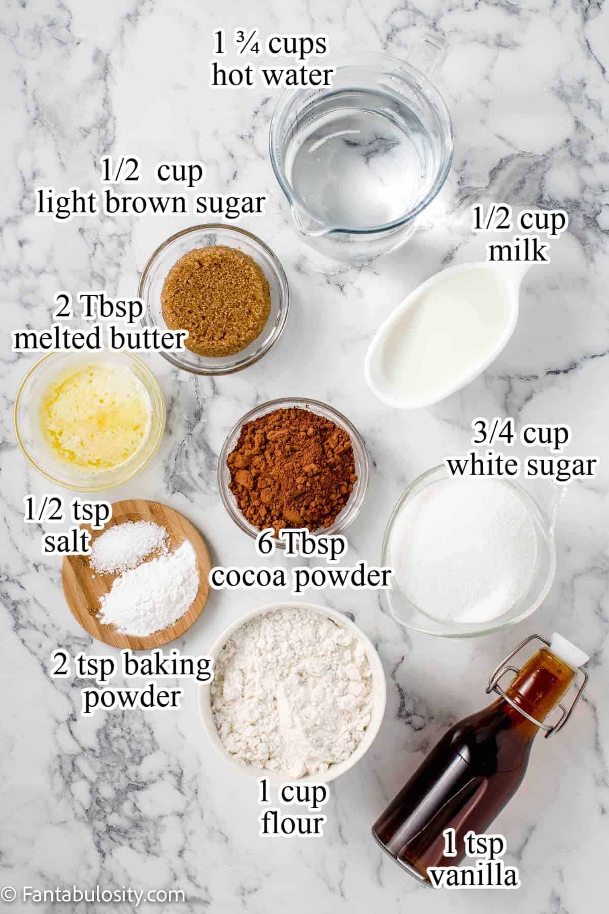 Ingredients for hot fudge cake sitting on kitchen counter, labeled with measurements.