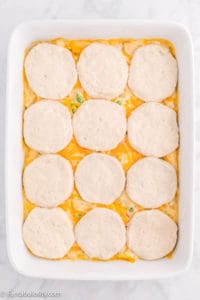 uncooked biscuits on casserole